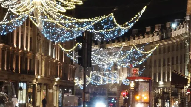 Sparkling Christmas lights on Regent Street, London at night.